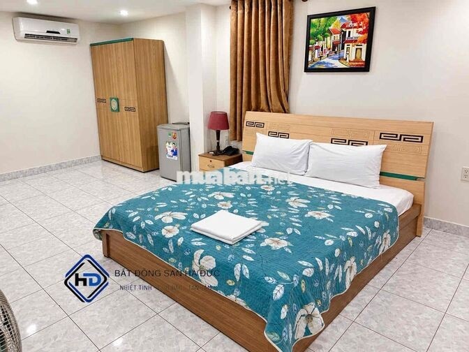 Toà nhà 7 lầu mặt tiền đường 26 phòng có hầm để xe