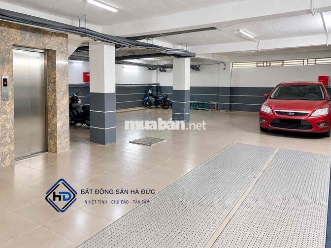 Toà nhà 7 lầu mặt tiền đường 26 phòng có hầm để xe