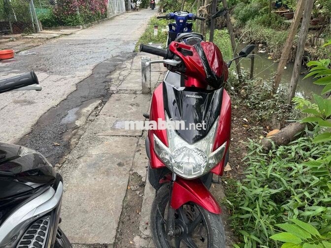 2 em  Honda Air Blade 2009 đỏ và đen