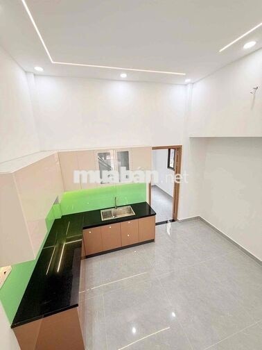 nhà mới nguyên căn 2 mặt tiền 246 đường 26/3