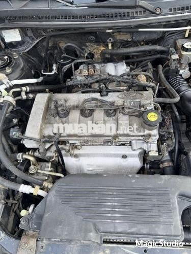 Ford Laser 2005 Ghia 1.8 AT Đen