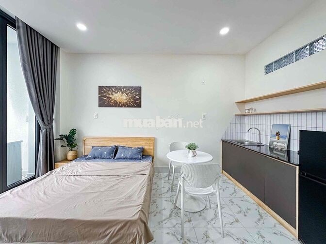 Căn hộ mới 100% ban công 38m2 máy giặt riêng ngay Trường Sa giáp Q1,3