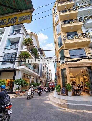 Tòa nhà Góc 2 mặt tiền 4 lầu, có thang máy