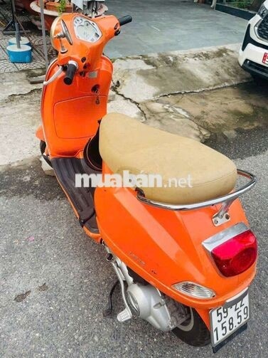 PIAGGIO VESPA LX MÀU CAM