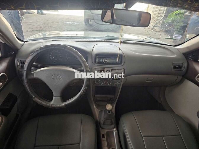 TOYOTA COROLLA 1.3 SỐ SÀN TRẮNG 5 CHỖ