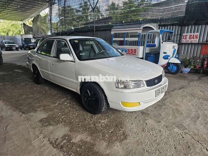 TOYOTA COROLLA 1.3 SỐ SÀN TRẮNG 5 CHỖ