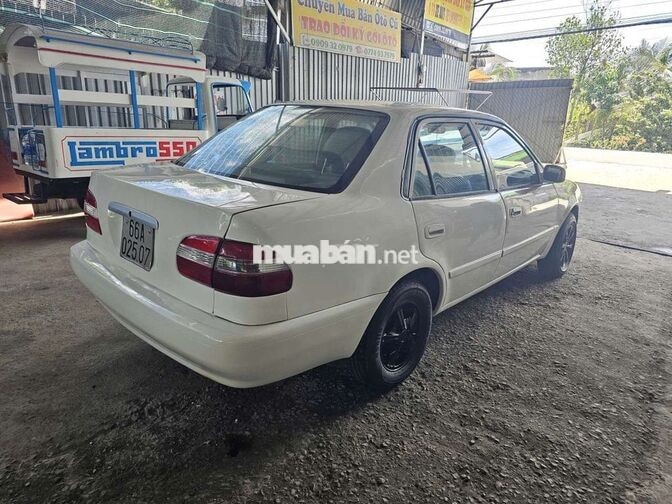 TOYOTA COROLLA 1.3 SỐ SÀN TRẮNG 5 CHỖ