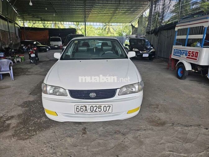 TOYOTA COROLLA 1.3 SỐ SÀN TRẮNG 5 CHỖ