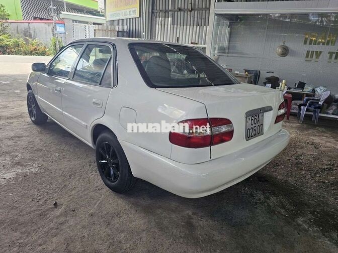TOYOTA COROLLA 1.3 SỐ SÀN TRẮNG 5 CHỖ