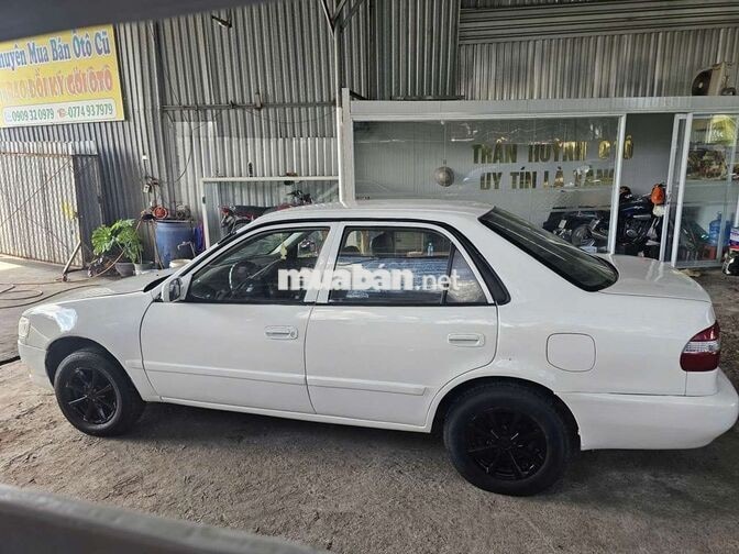 TOYOTA COROLLA 1.3 SỐ SÀN TRẮNG 5 CHỖ