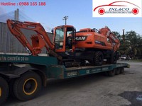 Chở máy móc công trình, xe lu, xe ủi giá rẻ Chở máy móc công trình, xe lu, xe ủi giá rẻ