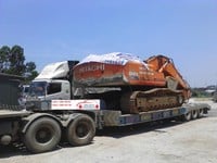 Vận chuyển máy xúc máy đào ghép máy móc nam bắc giá rẻ Vận chuyển máy xúc máy đào ghép máy móc nam bắc giá rẻ