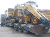 Chở máy công trình giá rẻ Chở máy công trình giá rẻ