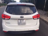 Cần bán xe Kia Rondo 2014 đk 2015 màu trắng fulloption kẹt tiền bán rẻ Cần bán xe Kia Rondo 2014 đk 2015 màu trắng fulloption kẹt tiền bán rẻ