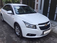 Em cần bán xe Chevrolet Cruze LT 2013 số sàn màu trắng Em cần bán xe Chevrolet Cruze LT 2013 số sàn màu trắng
