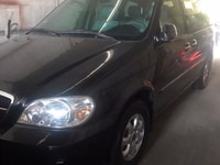 Bán gấp xe Kia Carnival 2008 tự động màu đen zin đẹp Bán gấp xe Kia Carnival 2008 tự động màu đen zin đẹp