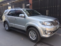 Xe Toyota Fortuner 2015 tự động xám bạc xe một chủ trùm mền ít đi. Xe Toyota Fortuner 2015 tự động xám bạc xe một chủ trùm mền ít đi.