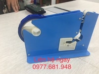 Máy buộc túi nilong, máy buộc đầu túi bóng,máy buộc túi trong siêu thị Máy buộc túi nilong, máy buộc đầu túi bóng,máy buộc túi trong siêu thị