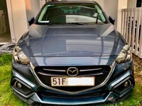 Hãng bán Mazda 2 sedan 2016, màu xanh làm, đã lên bodykit, biển TP Hãng bán Mazda 2 sedan 2016, màu xanh làm, đã lên bodykit, biển TP