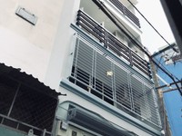 Nhà mới 5 lầu đường N.T.Hiền . Nhà mới 5 lầu đường N.T.Hiền .