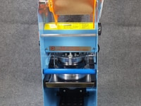 Máy dập nắp ly, dán miệng ly tiện lợi dùng cho quán cà phê, sinh tố Máy dập nắp ly, dán miệng ly tiện lợi dùng cho quán cà phê, sinh tố
