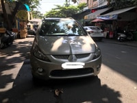 Bán gấp xe Mitsubishi Grandis, đời 2006, số tự động, màu vàng Bán gấp xe Mitsubishi Grandis, đời 2006, số tự động, màu vàng