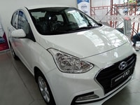 Grand i10 AT 4 cửa màu trắng giao ngay Grand i10 AT 4 cửa màu trắng giao ngay