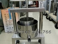 Máy vắt nước cốt dừa bằng tay dùng trong gia đình Máy vắt nước cốt dừa bằng tay dùng trong gia đình