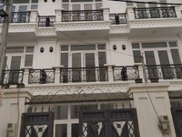 Nhà 4x15m,2 lầu,sân thượng,sân ô tô ngay UBND Phường Thạnh Lộc,Q12
