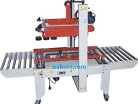 Máy dán băng dính 2 mặt thùng carton Máy dán băng dính 2 mặt thùng carton