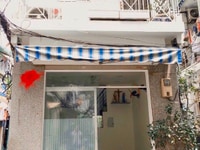 bán gấp nhà Tôn Thất Thuyết, Q4, 57m2, 990tr, tiện ở, sổ hồng riêng