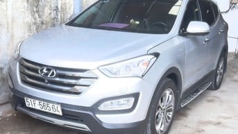 Bán xe Santafe đời 2015, màu xám, còn nguyên rin