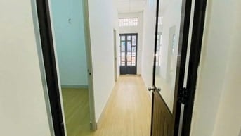 Nhà 1trệt 1lầu cần bán gấp ngay chợ Đầu Mối Hóc Môn _DT 64m2-Giá1tỷ520