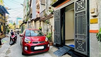 Nhà đường 5m Thông Bùi Quang Là F12 GV. 3.5x14 Trệt 2 lầu sân thượng