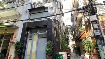 Góc Hẻm xe hơi Phan Văn Trị gần Ng Trãi,Ngang 4,05m 6Tầng,11PN,Nở Hậu