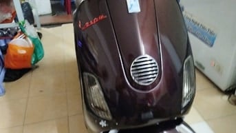 Bán xe Piaggio Vespa LX 125 màu nâu, đời 2012 tại Quận 4