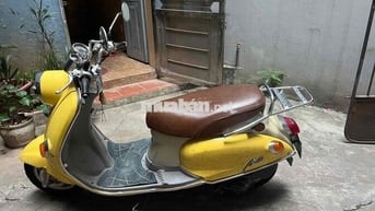 xe máy Suzuki bella vàng