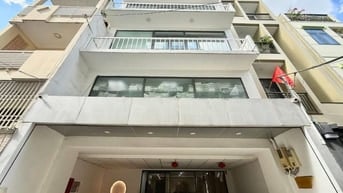 TOÀ VĂN PHÒNG " HUỲNH VĂN BÁNH" 103m2 ( 7x15m ) 5 TẦNG THUÊ 75TRIỆU