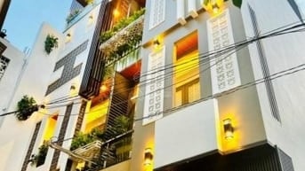 Bán toà mặt tiền Trường Chinh, dt 10.5 x 13m, Hầm 5 lầu st, nhà mới