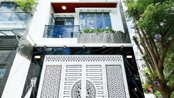 HOT.  BÁN NHÀ PHỐ MỚI XÂY 5x14 - 4 TẦNG - GARA OTO - 9T2 -GIÁP Q7 1KM