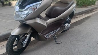 Cần bán xe Honda PCX 125cc màu vàng be, kim phun FI
