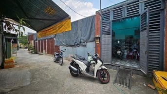 Bán nhà trệt + lửng đúc - hẻm xe hơi - đường ĐHT 02