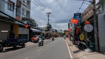 Nhà 4 tầng mặt đường Gò Ô môi Quận 7. 9*24 chỉ 22 tỷ. KDBB sầm uất.