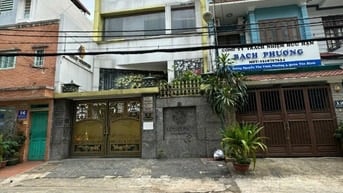 Bán gấp giá 36.5 tỷ. Tòa nhà 14 Nguyễn Văn Vĩnh, Khu sân bay, trệt 5L