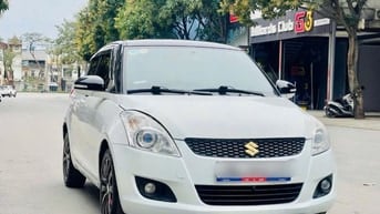 Bán Suzuki Swift Trắng SX 2015 1.4AT Bản Spenciel Logo Vàng