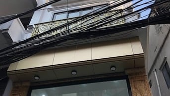 Nhà riêng 51m x 7T thang máy, oto vào nhà, sát Hồ Đền Lừ, giá 20.9 tỷ