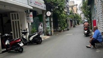 Nhà HXH 345 Trần Hưng Đạo, Q1. DT 4x20m, 4 tầng