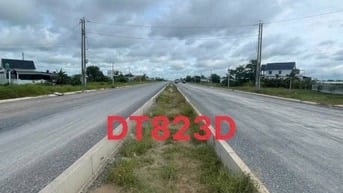 Cần tiền bán gấp lô đất kế bên DT 823D