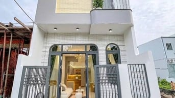 Nhà 2 lầu  ngay chợ đêm bà tri Tân Uyên TPHCM (BD cũ)