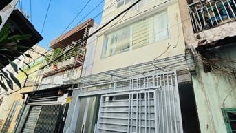 Nhà mới 4x10m 1 trệt 3 lầu st 5PN 3WC gần Trường TH Hiệp Tân